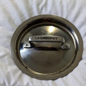 Le Creuset stainless steel 6.5 inch replacement lid.  GUC. 5.5 inch inside.